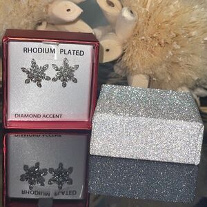 Rhodium plated diamond accent snowflake earrings